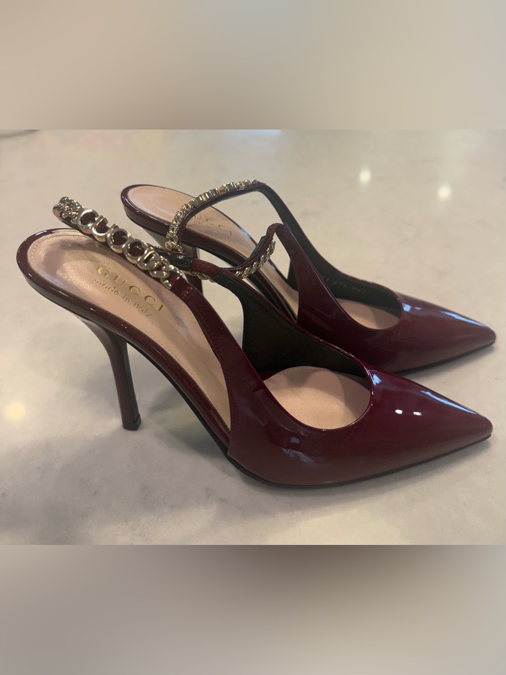 Gucci  NEW Burgundy Signori Patent Leather Slingback Heels w/Gold Chain Detail